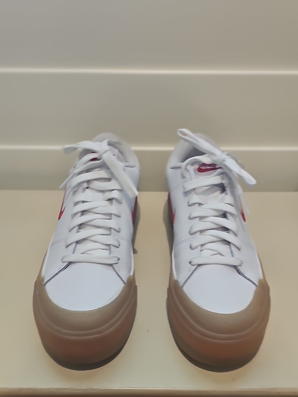 Nike White Sneakers with Red Swoosh and Gum Soles